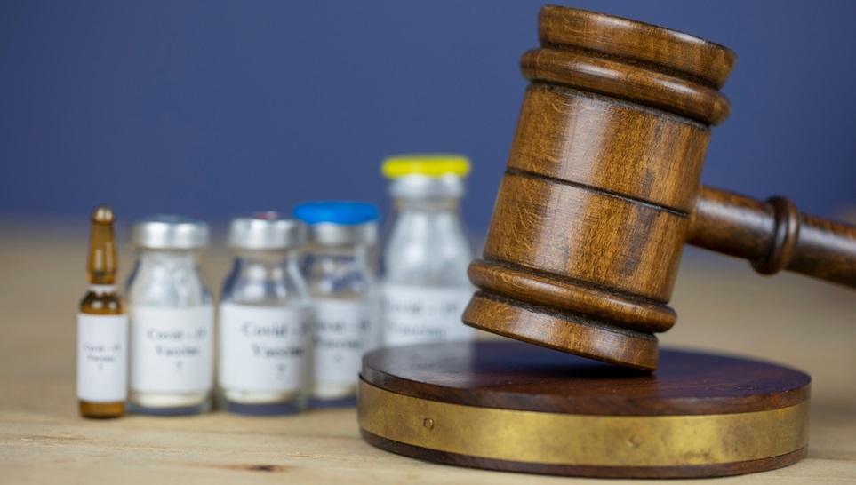 gavel and different types of vaccines