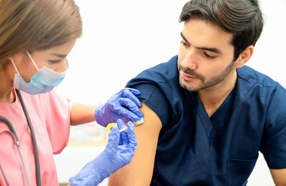 patient getting a flu vaccine