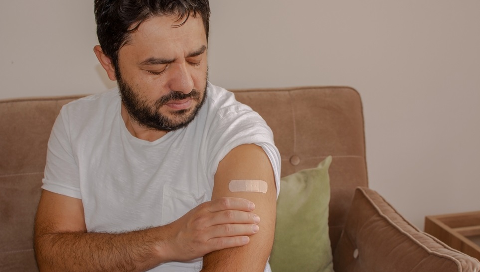man hurting because of a vaccine injury