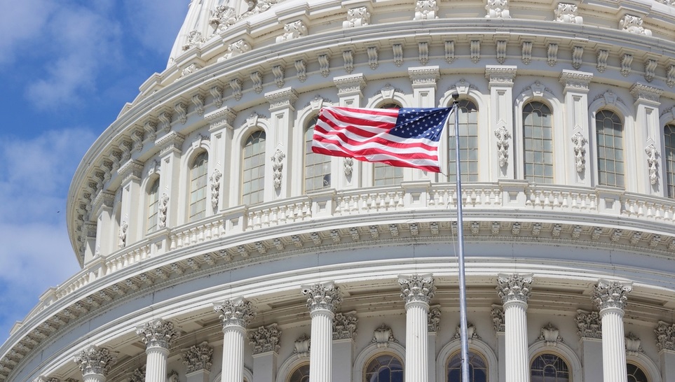 the us congress with the flag of united states