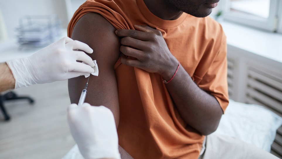 an adult getting a vaccine