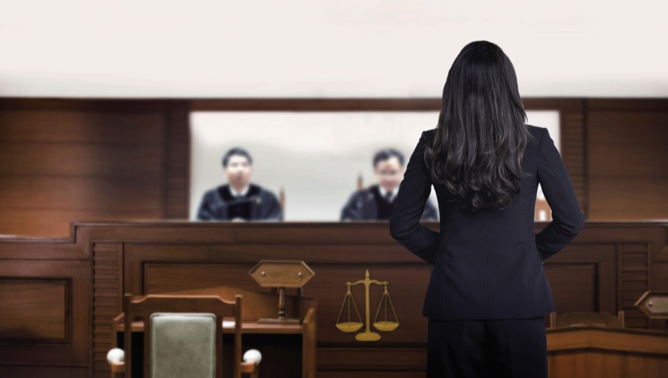 lawyer presenting her vaccine case in a court