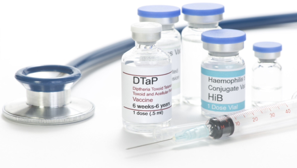 dtap and hib vaccine with stethoscope vials and syringe