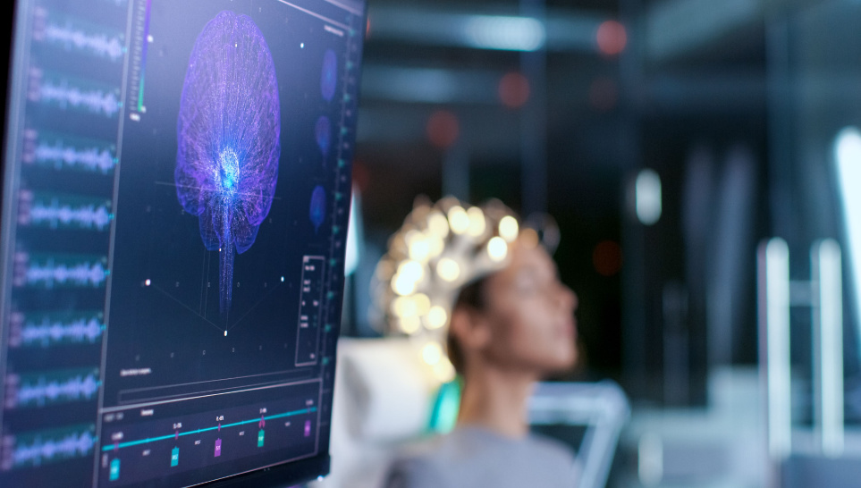 monitor show eeg reading and brain model woman wearing brainwave scanning headset