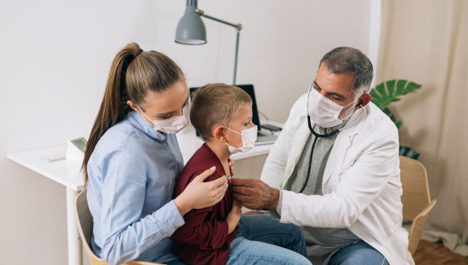 mother and her child visiting pediatrician after having seizure