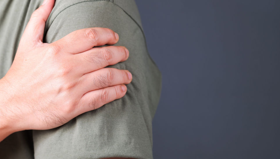 man showing rotator cuff vaccine injury symptoms