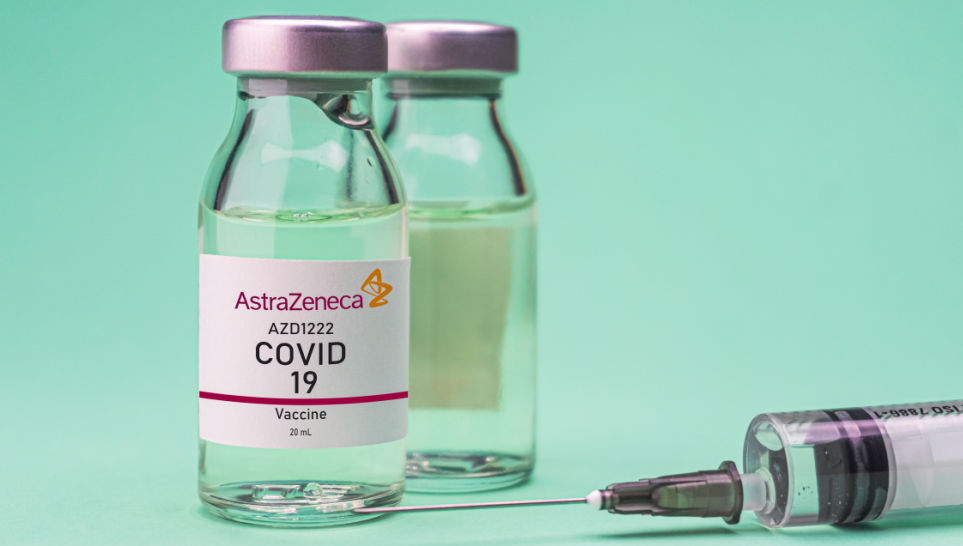 astrazeneca vaccine isolated on green background with syringe