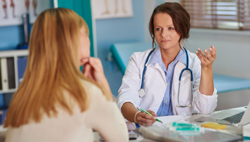 patient consulting doctor before getting vaccine