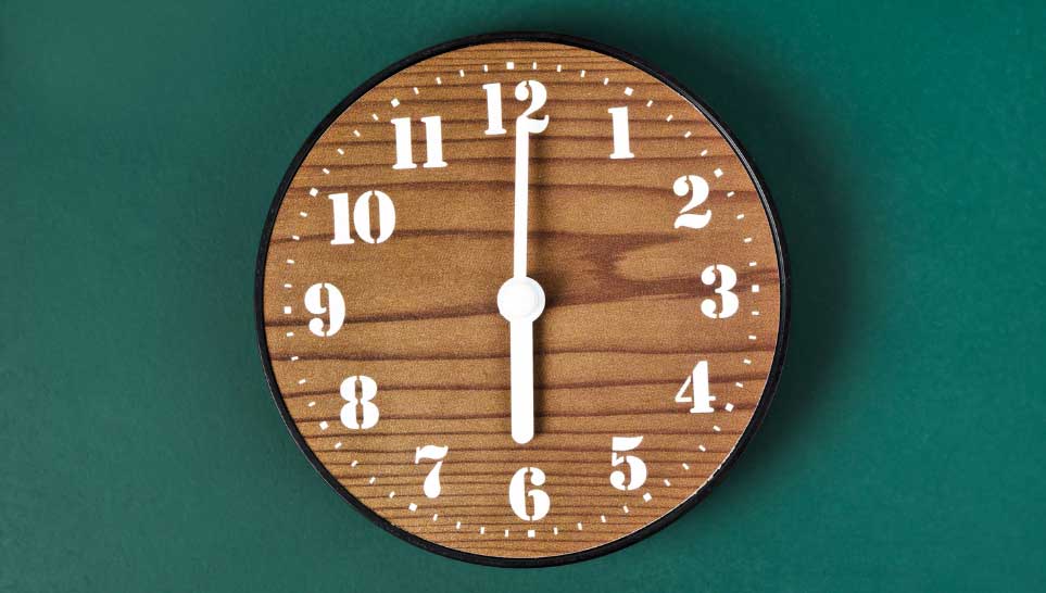 retro clock on green background