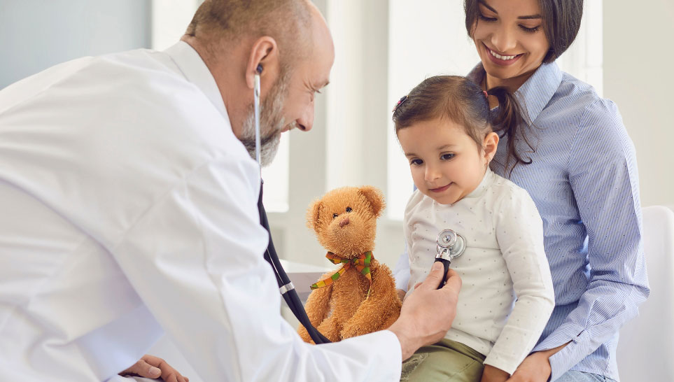 mother with her child consulting to doctor