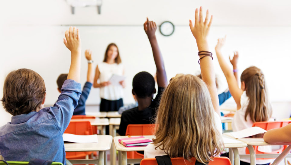 teacher and school kids in classroom