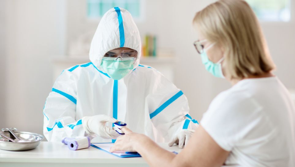 patient consulting nurse after receiving covid vaccine