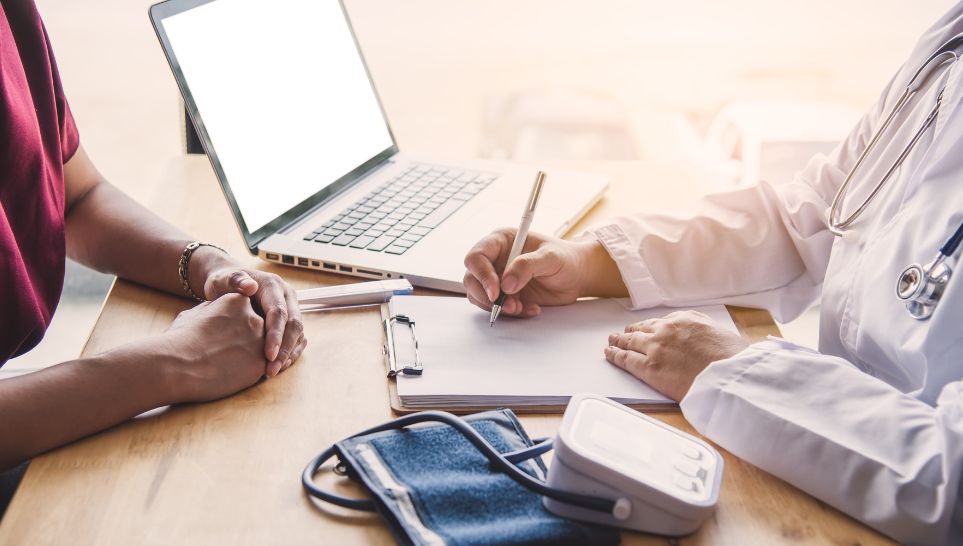 woman consulting doctor before getting pneumonia shot