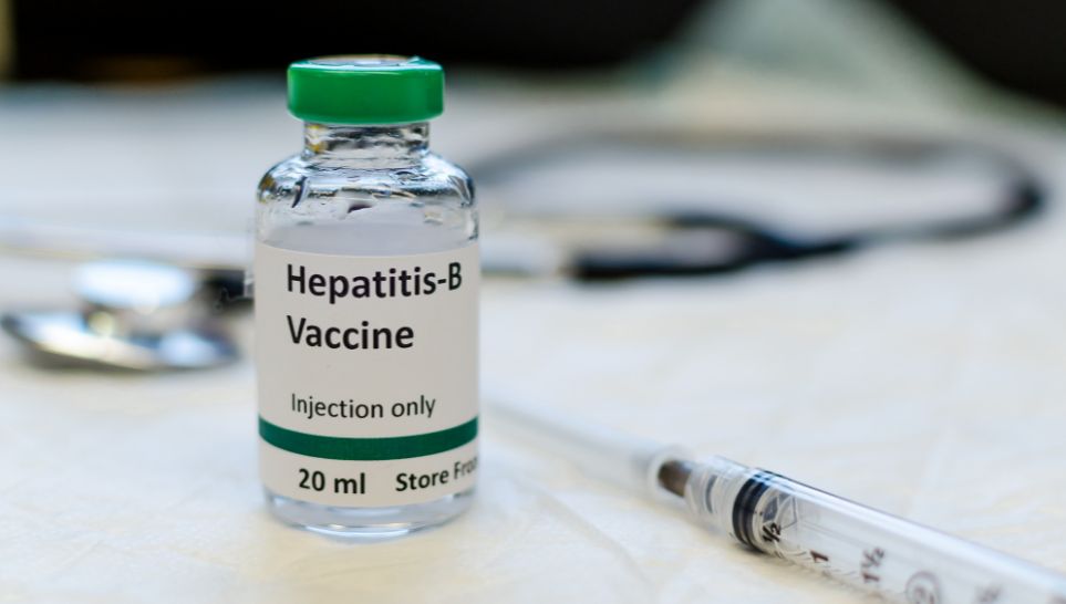 hepatitis b vaccine vial syringe and stethoscope